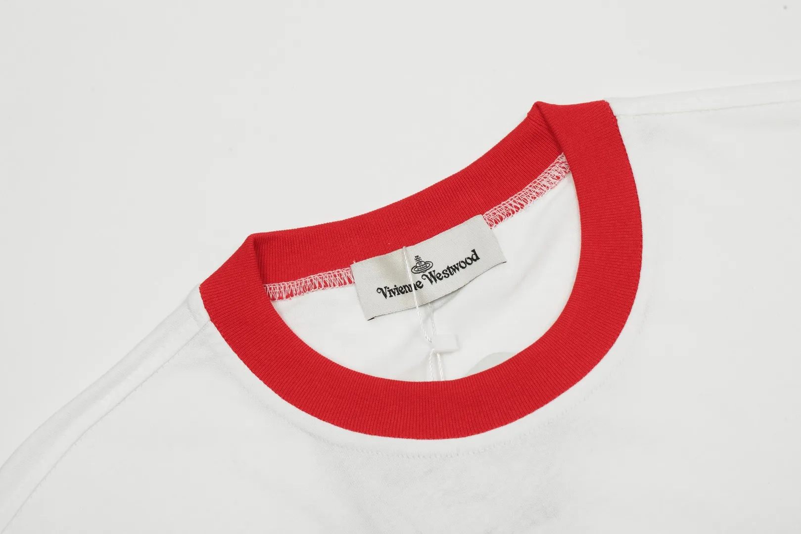 VIVI11vivienne west wood West Queen Vivian Saturn Poker Contrast Color Short Sleeve Size: XS-L Color: Black White